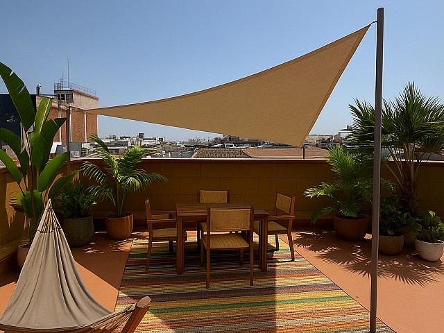 巴塞罗那市中心顶层公寓 —— 带全景露台的翻新瑰宝