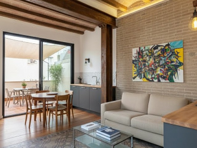 calle Sardenya proyecto Salón cocina abierta y ventanal