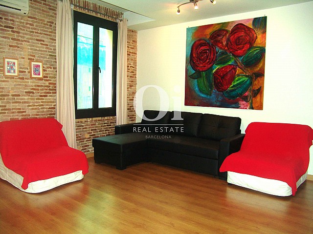 Sala de estar de magnifico apartamento en venta en Raval
