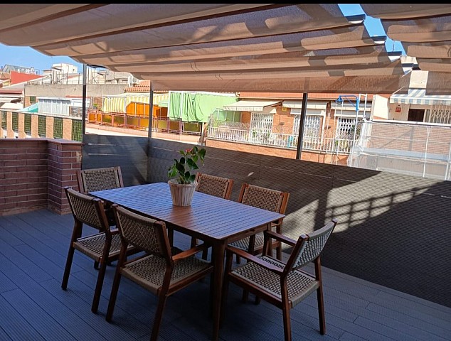 Ático en venta con dos terraza y parquin en el corazon de Gracia