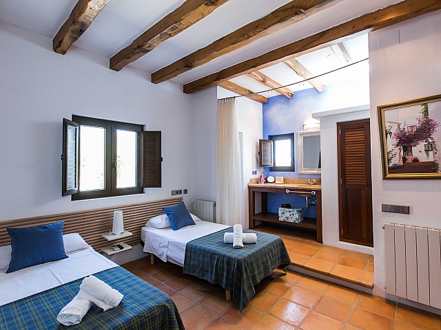 Bedroom with two beds in awesome property is for rent in Ibiza