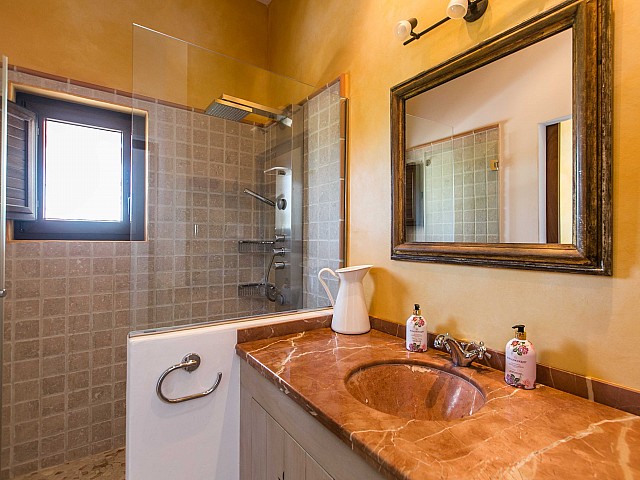Bathroom with shower in awesome property is for rent in Ibiza