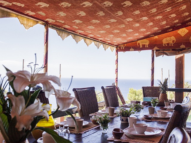 Comedor de verano de villa única de lujo en alquiler en Portixol, Ibiza