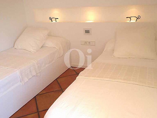 Уютная спальня квартиры на продажу в Ибице