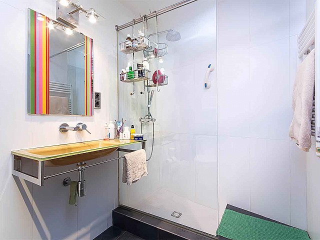 beautiful bathroom with a shower cabin in luxurious apartment to rent in Barcelona