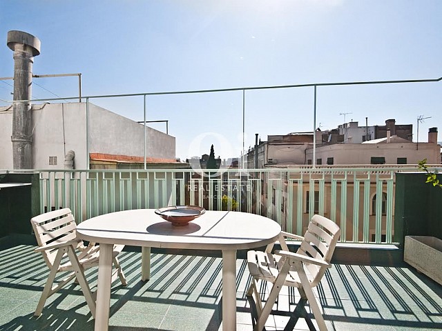 Sunny terrace with dining area